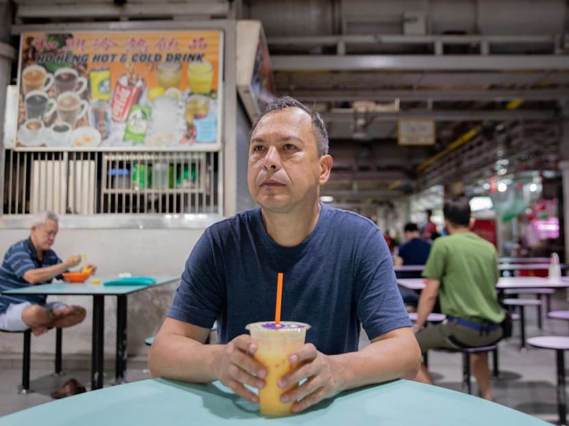 Operating theatre technical assistant Alexander Franklin Alrivers at a food centre near his home in Jurong West.