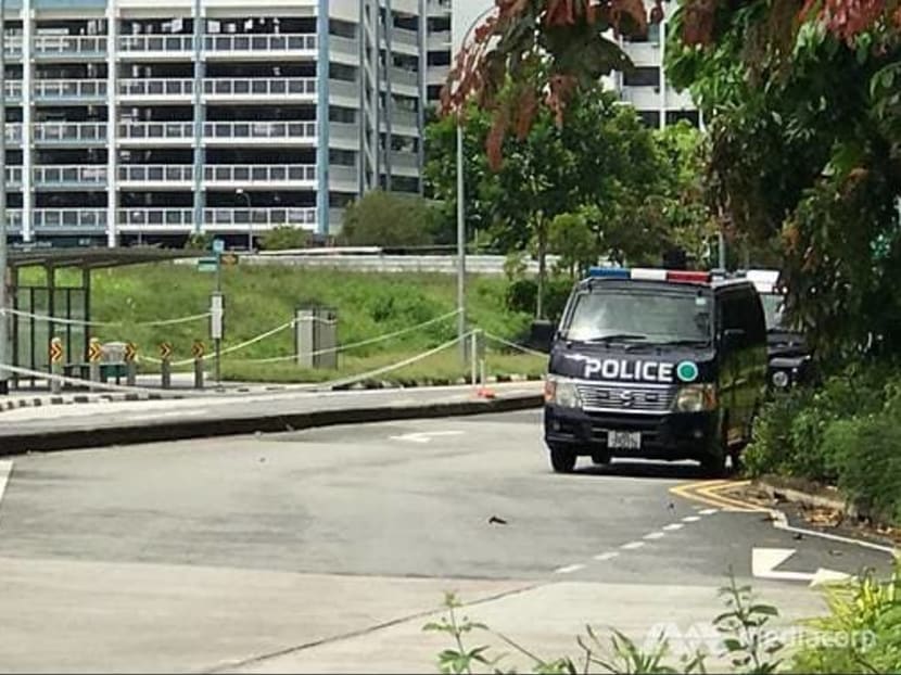 Police cordoned off the area near a bus stop along Punggol Field on May 11, 2020 to investigate the murder of Tay Rui Hao.