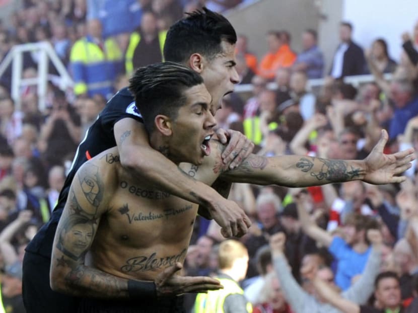 Liverpool fans in Sydney will get to see the likes of Roberto Firmino (right) in action in May when the Reds play Sydney FC at the Olympic Stadium. Photo: Reuters