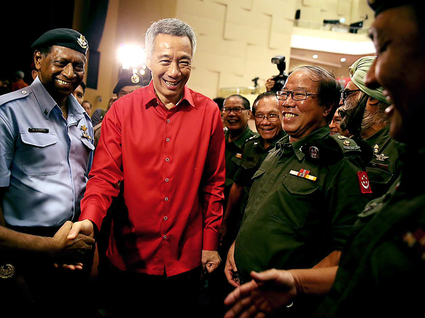 PM Lee Hsien Loong meeting SAF veterans after the National Day Rally 2015. Photo: Don Wong