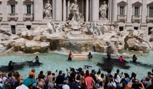 Trevi Fountain water turns black in Rome climate protest