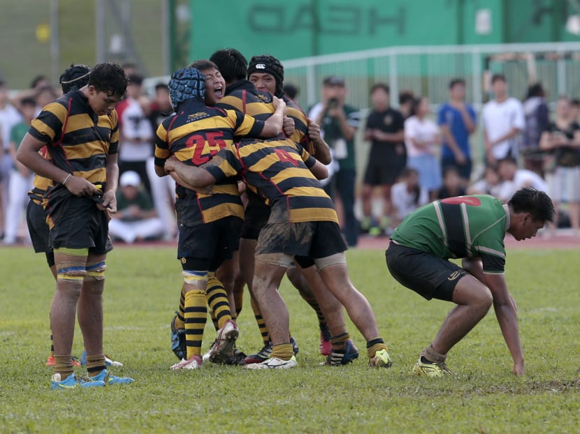 Anglo-Chinese School (Independent) players celebrating at the end of the final. Photo: Jason Quah/TODAY