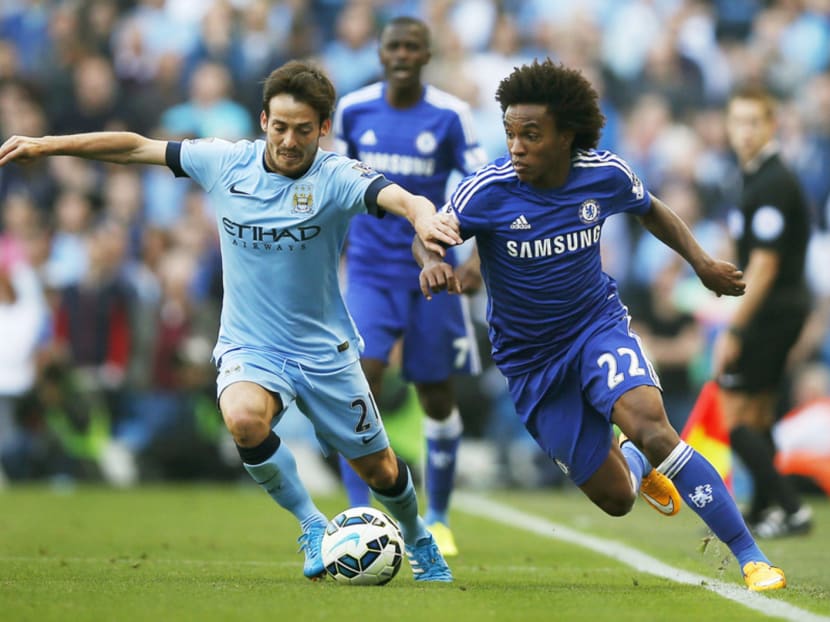 City could consider utilising an adventurous formation with David Silva (left) to surprise Chelsea. REUTERS