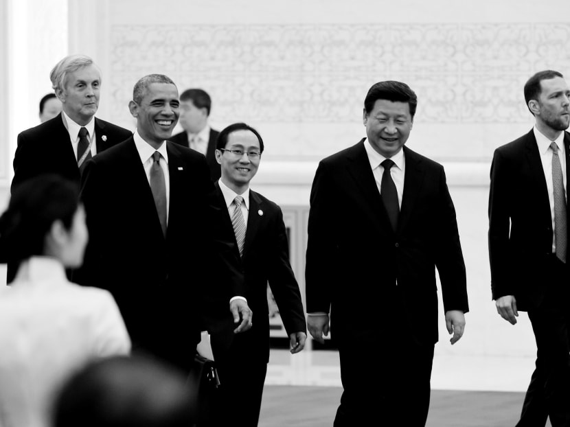 Chinese President Xi Jinping (2nd R) and U.S. President Barack Obama arrive for a lunch banquet in the Great Hall of the People in Beijing November 12, 2014. Photo: Reuters