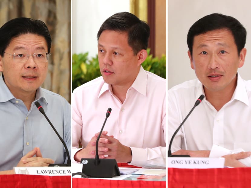 From left: Education Minister Lawrence Wong, Trade and Industry Minister Chan Chun Sing and Transport Minister Ong Ye Kung From left: Education Minister Lawrence Wong, Trade and Industry Minister Chan Chun Sing and Transport Minister Ong Ye Kung