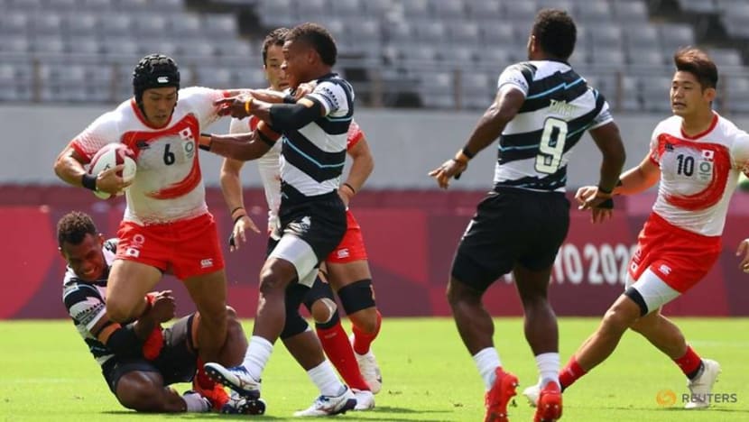 Olympics-Rugby-Reigning champions Fiji scrape past Japan in Sevens opener Olympics-Rugby-Reigning champions Fiji scrape past Japan in Sevens opener