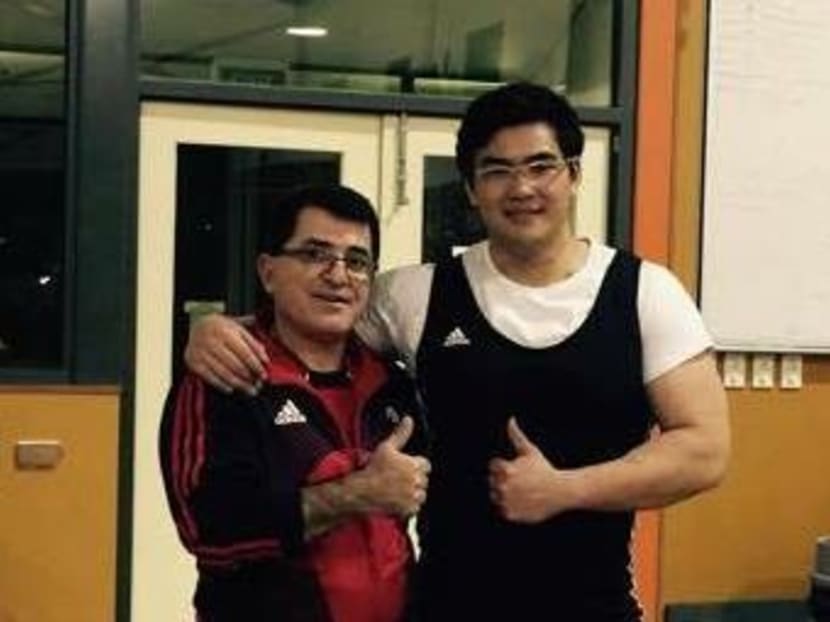 Scott Wong (right) with his coach Yurik Sakisyan. His new record of 306kg means that he is just 6kg shy of the 312kg mark to qualify for the 2018 Commonwealth Games. Photo: Scott Wong.