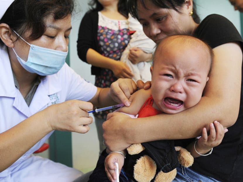 Parents have been forced to travel from clinic to clinic in search of vaccines. Photo: Reuters