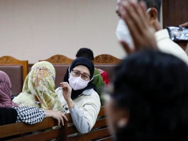 Safitri Puspa, 42, the mother of an acute kidney injury (AKI) victim, attends a preliminary hearing for a class-action lawsuit filed against the Indonesian government and drug companies for allowing the sale of tainted cough syrup at the court in Jakarta, Indonesia, on January 17, 2023.
