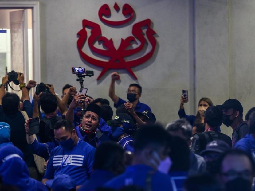 Barisan Nasional supporters at the coalition’s command centre at the Johor Umno Liaison Hall in Johor Baru on March 12, 2022.
