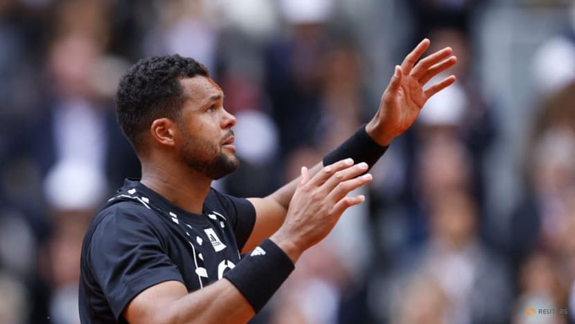 Tears flow as Tsonga retires after French Open defeat Tears flow as Tsonga retires after French Open defeat