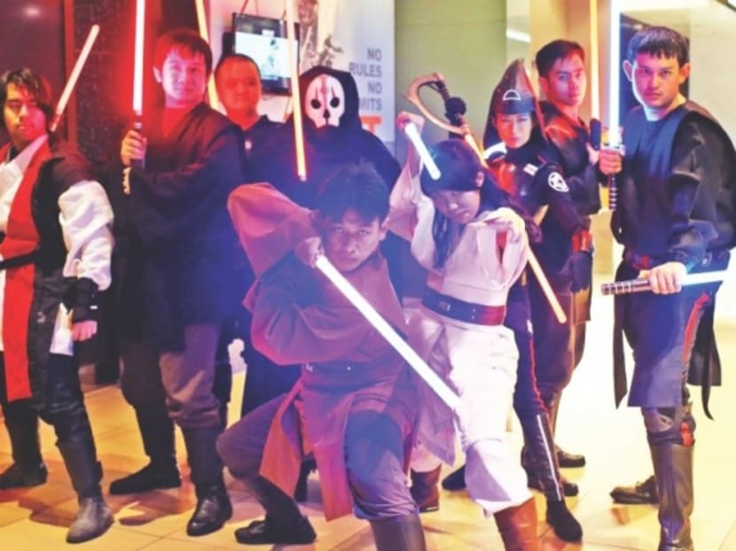 Members of the Star Wars Malaysia Fan Club decked in costumes during the Star Wars: The Force Awakens premiere at TGV Sunway Pyramid on Dec 24, 2015. Photo: Malay Mail Online
