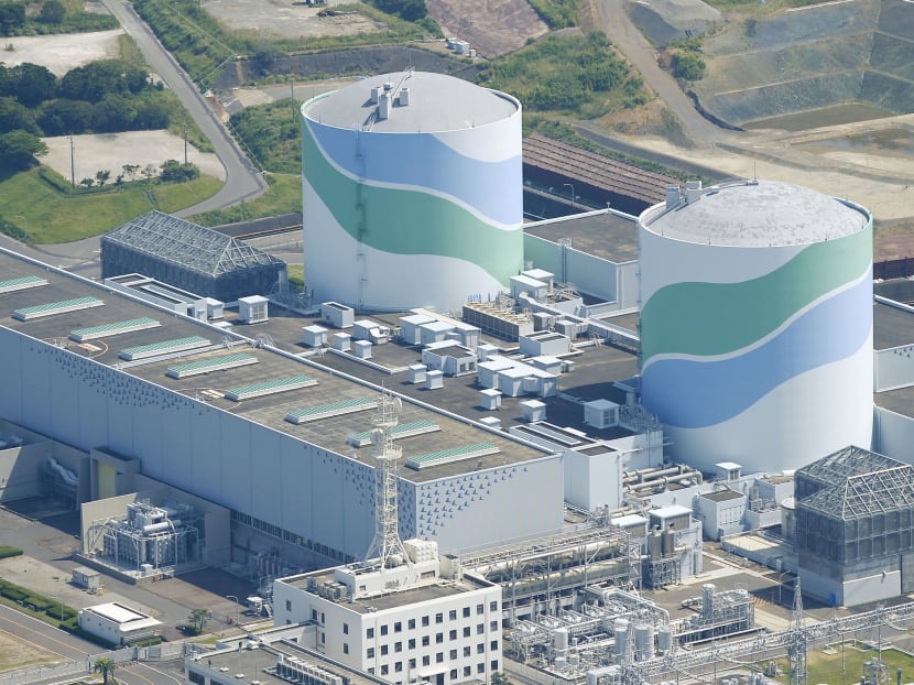 An aerial view shows the No.1 (L) and No.2 reactor buildings at Kyushu Electric Power's Sendai nuclear power station in Satsumasendai, Kagoshima prefecture, Japan, August 11, 2015, in this photo taken by Kyodo. Photo: Reuters