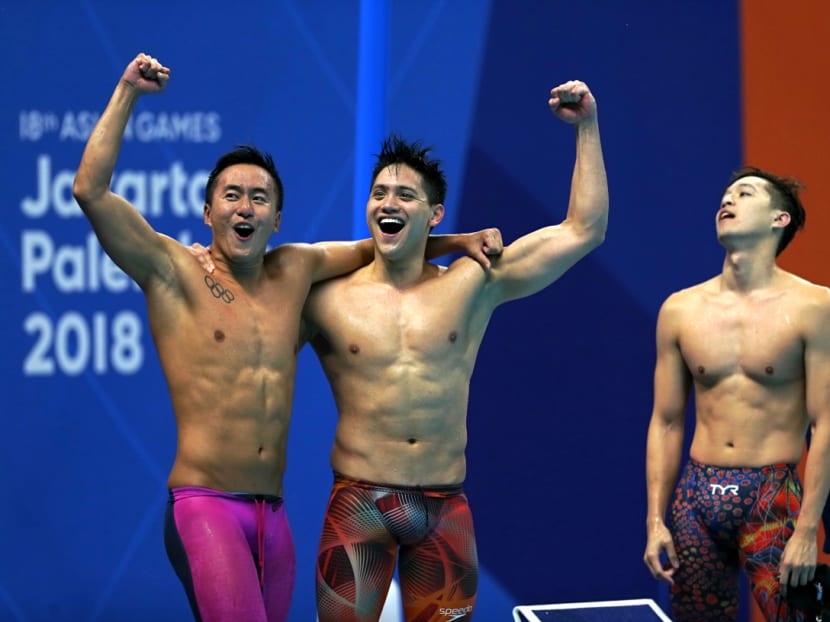 Men 4x200m Freestyle Final at the Gelora Bung Karno Aquatics Centre in Jakarta on Monday (Aug 20). Team of Quah Zheng Wen (Left), Joseph Schooling (centre), Danny Yeo (right) and Jonathan Tan (not pictured). They won the bronze medal, setting a new National Record at 7min 14.15s in the process.