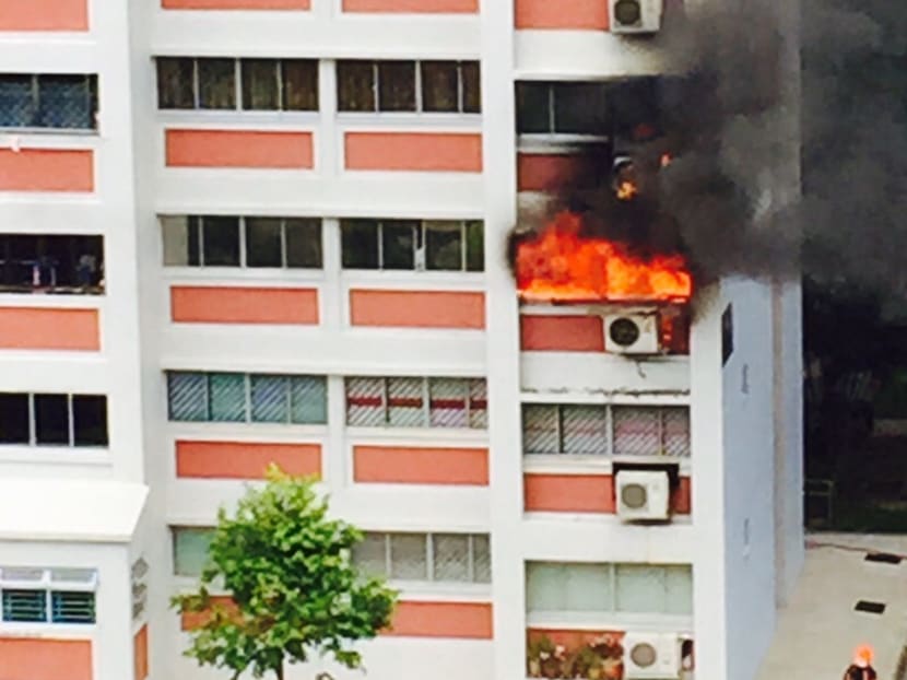 Unit fire breaking out at Blk 110, McNair Rd in Balestier on May 30. Photo: Jasmine Rizhwana
