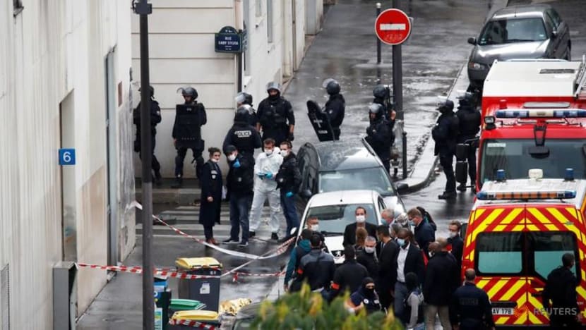 Knifeman in Paris wounds two at scene of Charlie Hebdo attacks Knifeman in Paris wounds two at scene of Charlie Hebdo attacks