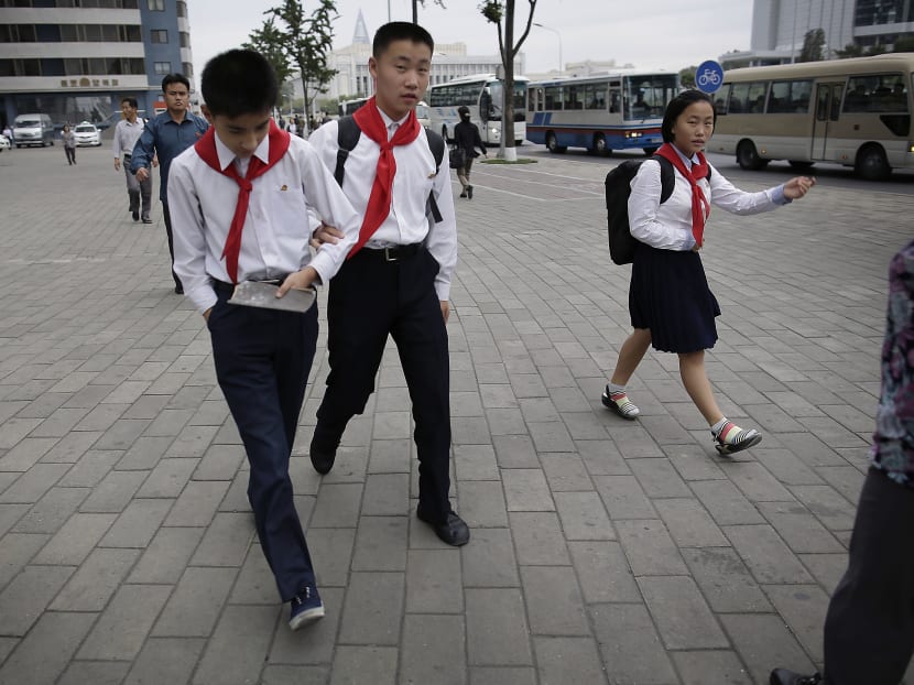 Pyongyang starts the day early, with patriotic music