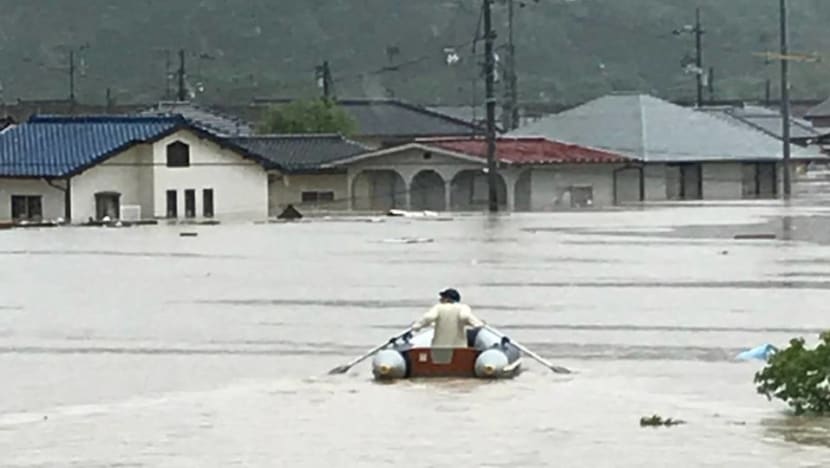 Japan's flood hero: 20 lives saved in a blow-up boat Japan's flood hero: 20 lives saved in a blow-up boat