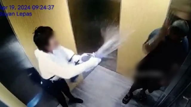 马国妇女电梯内泼热水灼伤唐氏青年 警方：双方曾有误会