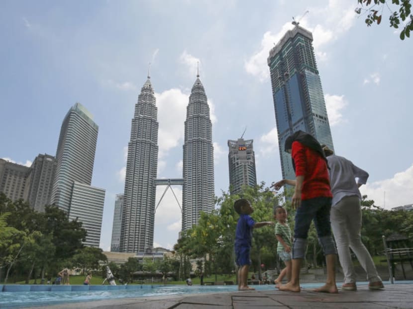 Singapore tourists to Malaysia aren't too concerned about the tax, thanks to the favourable exchange rate between the Singapore dollar and the ringgit. AP file photo