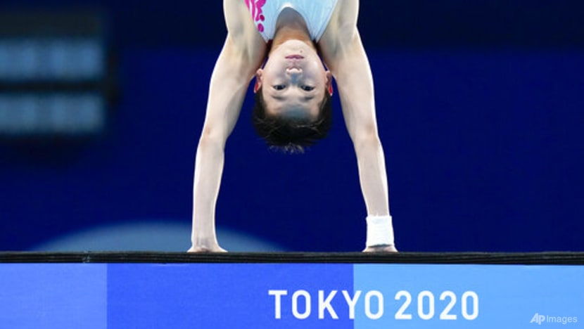 China's Quan, 14, wins Olympic gold with three perfect dives China's Quan, 14, wins Olympic gold with three perfect dives
