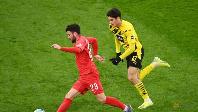 Football: Dortmund beat Augsburg 3-1 for first win in four games Football: Dortmund beat Augsburg 3-1 for first win in four games