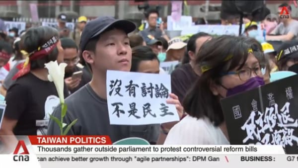 Taiwanese gather in protest against controversial reform bills
