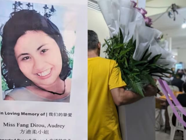 A man carrying a wreath at the funeral wake of Singaporean Audrey Fang, who was killed in Spain.