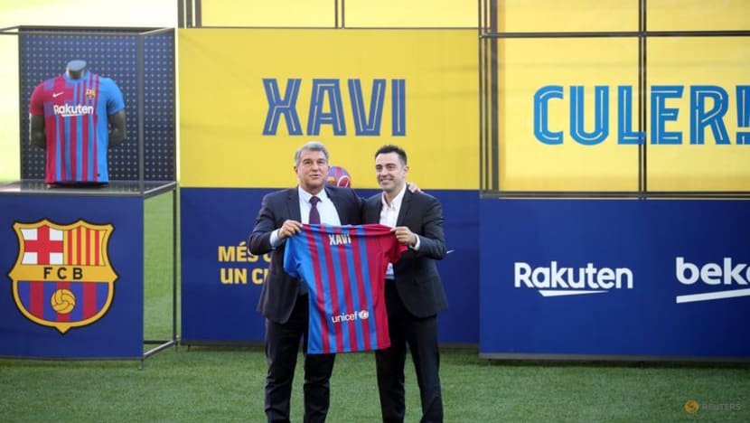 Barca unveil Xavi as new manager in front of thousands at Camp Nou Barca unveil Xavi as new manager in front of thousands at Camp Nou