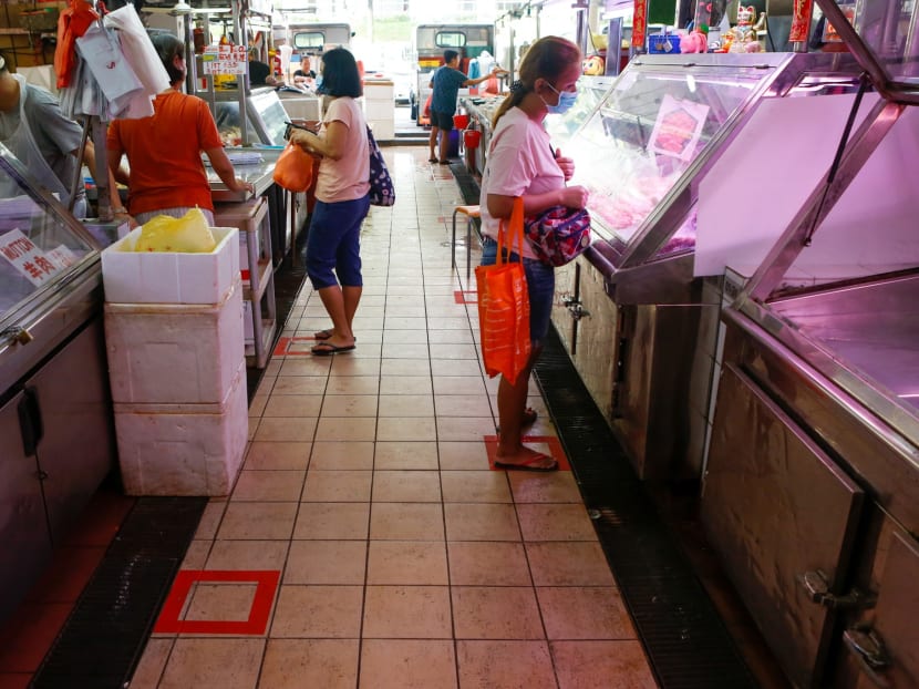 Floor markings at the Bukit Timah Market & Food Centre on Thursday (April 2, 2020), as part of new social distancing measures introduced by the National Environment Agency.