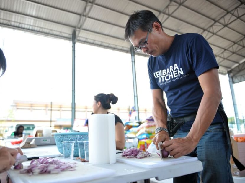 Founder of Kembara Kitchen, William Cheah, (right) helping with the food preparation. Photo: The Malay Mail Online Founder of Kembara Kitchen, William Cheah, (right) helping with the food preparation. Photo: The Malay Mail Online