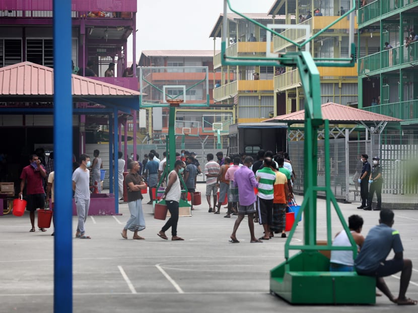 Workers living in S11 Dormitory in Punggol were seen hanging out at common areas on April 6, 2020. Workers living in S11 Dormitory in Punggol were seen hanging out at common areas on April 6, 2020.