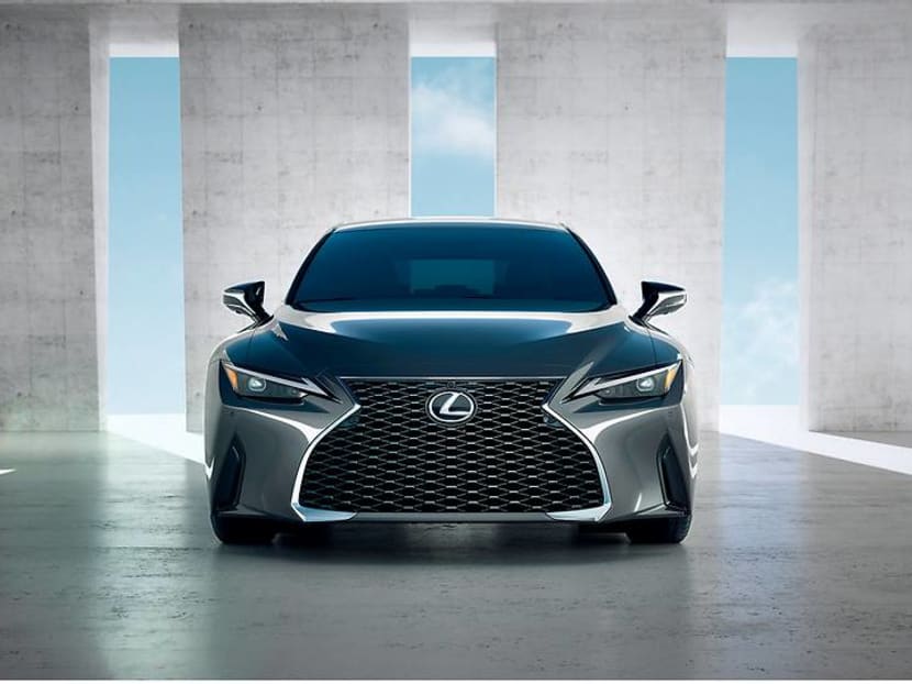 Why is the new Lexus IS still equipped with a built-in CD and DVD player?