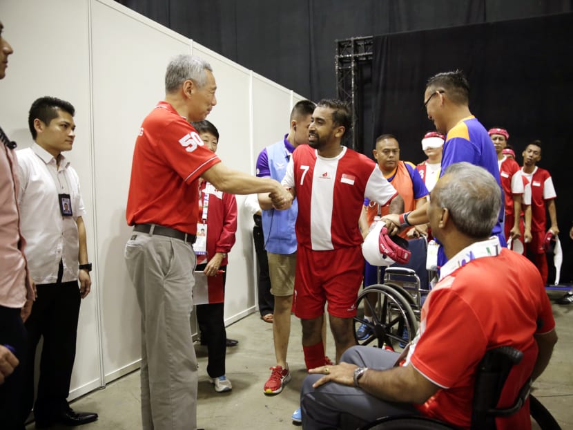 Prime Minister Lee Hsien Loong paid a surprise visit  to the 5-a-side football team today. Photo: Wee Teck Hian