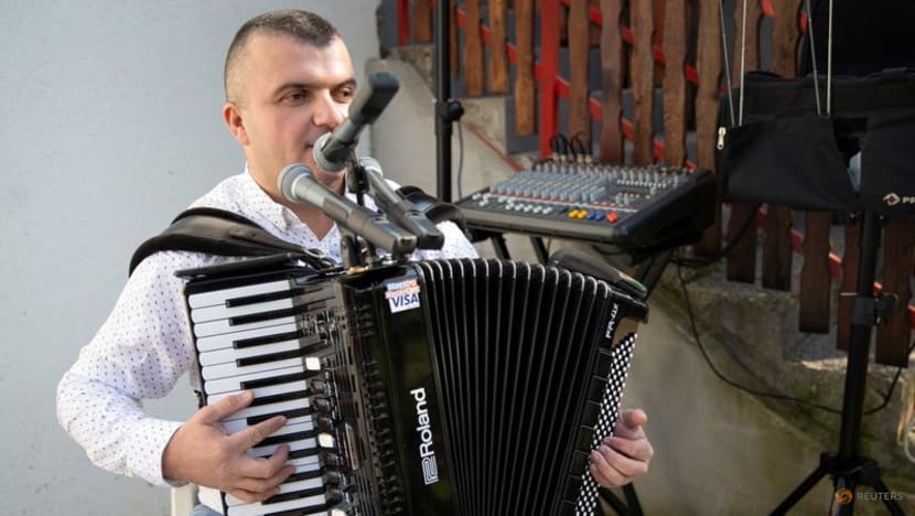 If cashless, tip Bosnian wedding musician by tapping bank card If cashless, tip Bosnian wedding musician by tapping bank card
