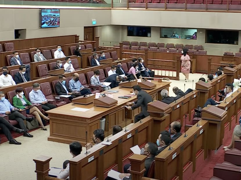 MPs sitting together in Parliament's main chamber on April 4, 2022. It is the first time they have sat together in this way in two years.