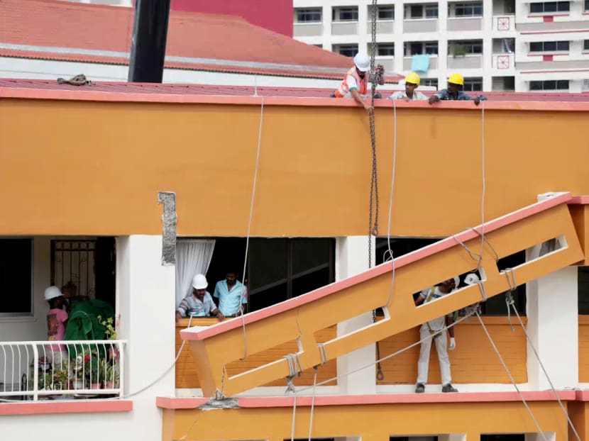 A sun breaker outside one of the 4th-floor flats at Blk 201E Tampines Street 23 has collapsed partially. Photo: Jason Quah