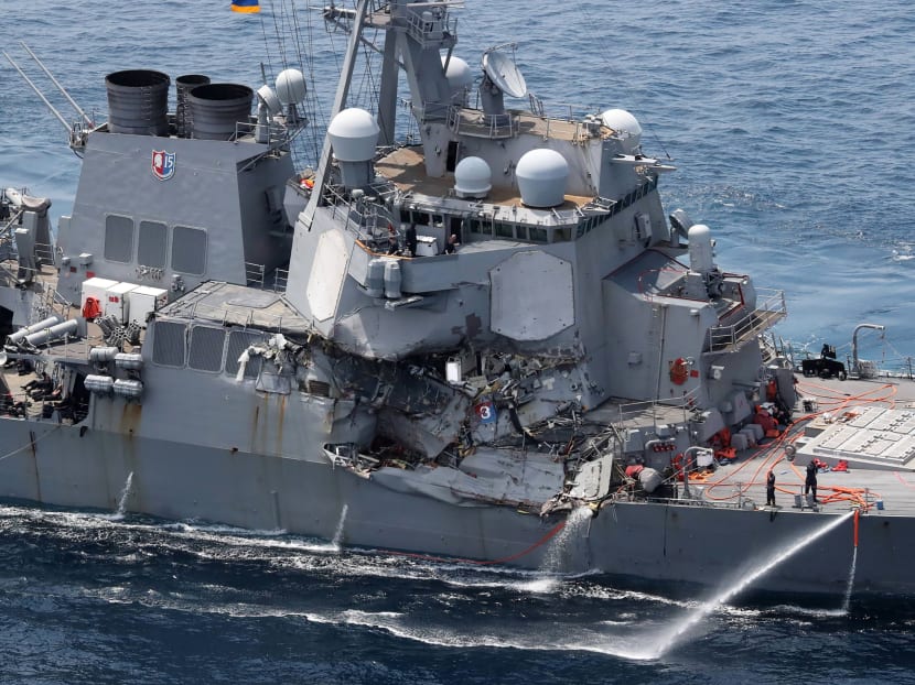 File photo of the damage seen on the guided missile destroyer USS Fitzgerald off the Shimoda coast, after it collided with a Philippine-flagged container ship, on June  17, 2017.
 Photo: AFP
