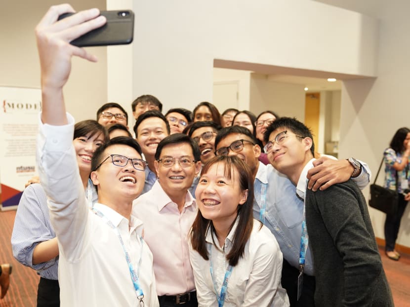 Finance Minister Heng Swee Keat (second row, second from left) having his picture taken with university student leaders after the NTU Students' Union Ministerial Forum on March 28, 2019.