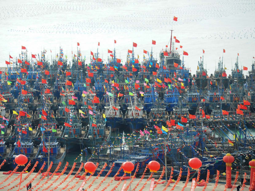 Fishing boats decorated for the Lantern Festival in China. Jakarta claims it tried to detain a Chinese boat for fishing illegally in its waters, but was prevented from doing so by the Chinese coast guard. Photo: Reuters
