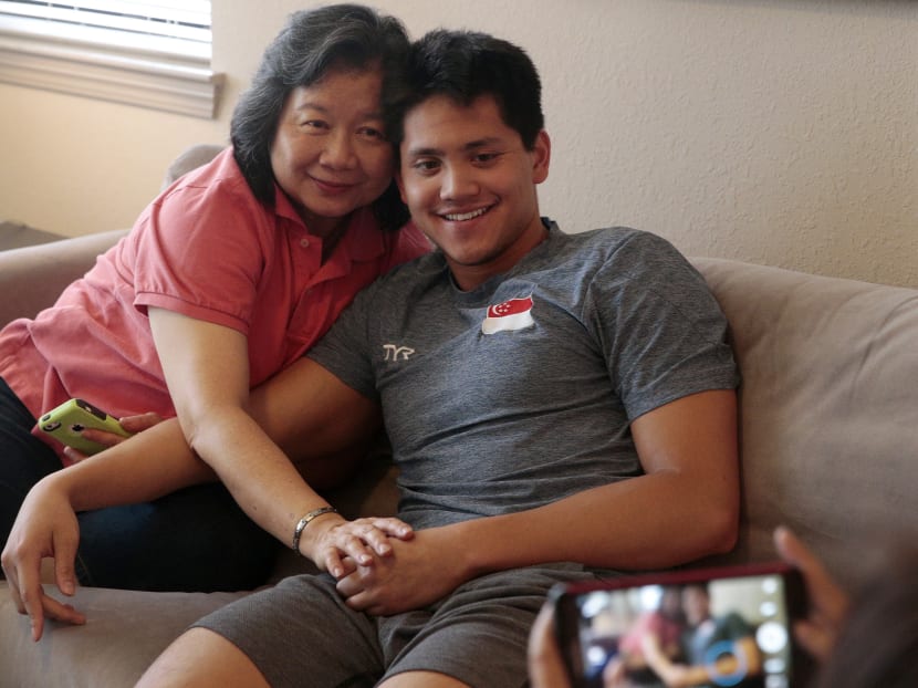 Joseph Schooling and his mother May pose for a photo together in his apartment after an interview, in Fort Lauderdale, Florida, on June 21, 2016. Photo: Jason Quah