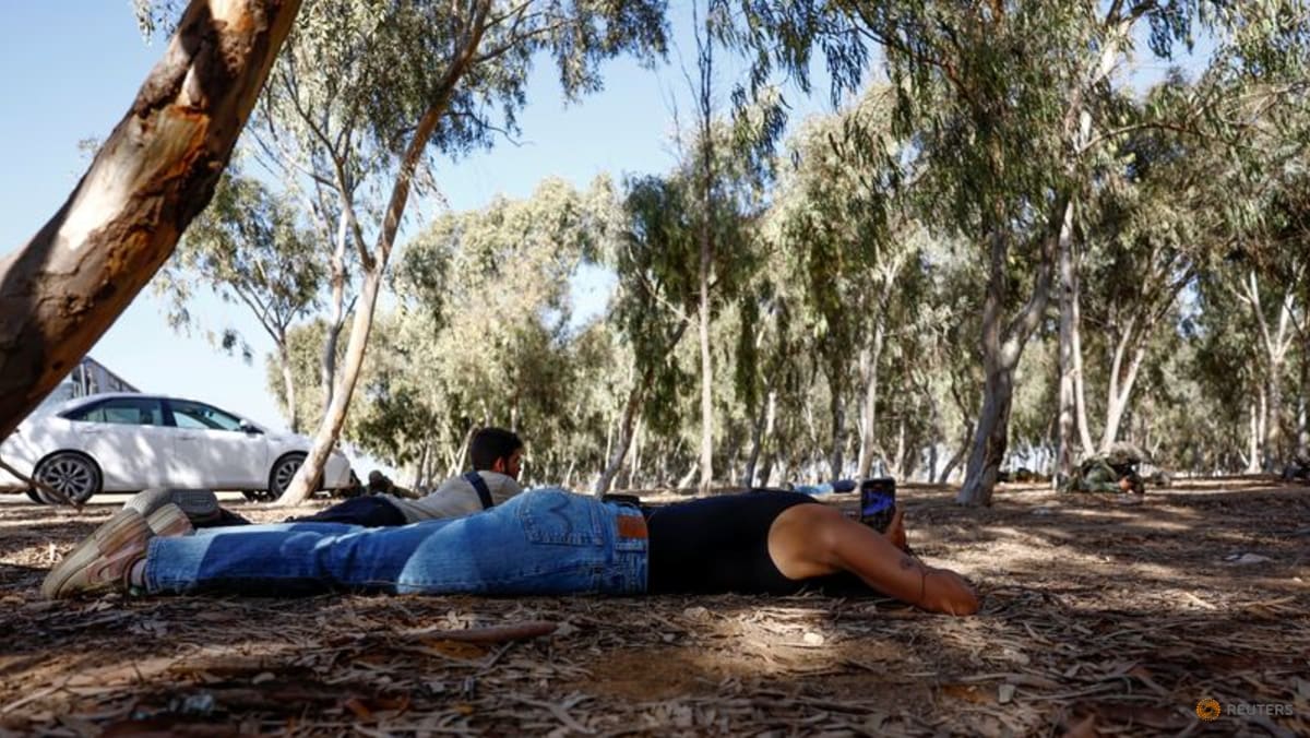 Israeli survivor makes emotional return to scene of Hamas attack TODAY