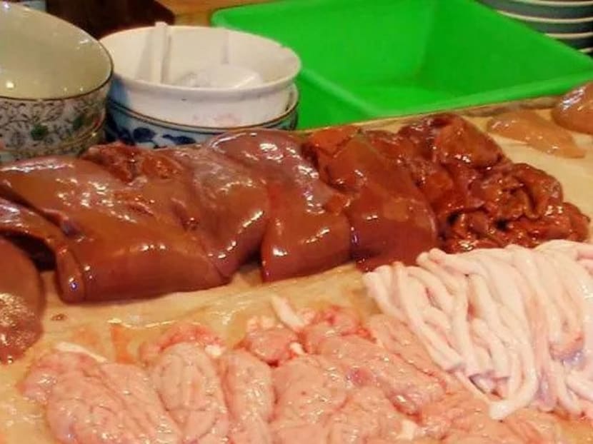 Pig liver sold next to offal in a market in a night market in Taiwan.