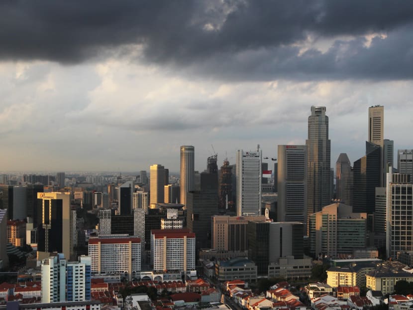 The Central Business District of Singapore bathed  in evening light on 19 July 2014. Photo: Ooi Boon Keong