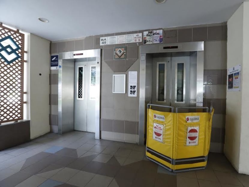 An elderly woman's hand was severed in a lift accident on Oct 9, 2015 at Block 322 Tah Ching Road. Photo: Ernest Chua