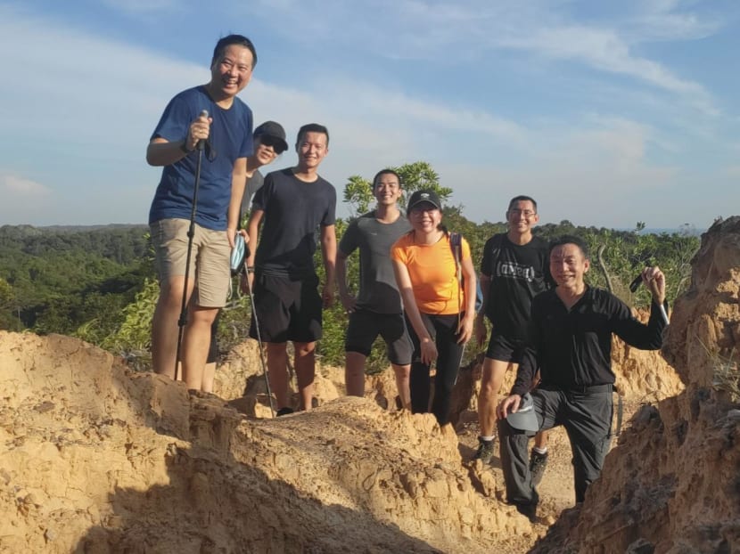 The writer (third from left) hiking in Brunei with colleagues and Singapore healthcare professionals during a work trip there with them. The writer (third from left) hiking in Brunei with colleagues and Singapore healthcare professionals during a work trip there with them.
