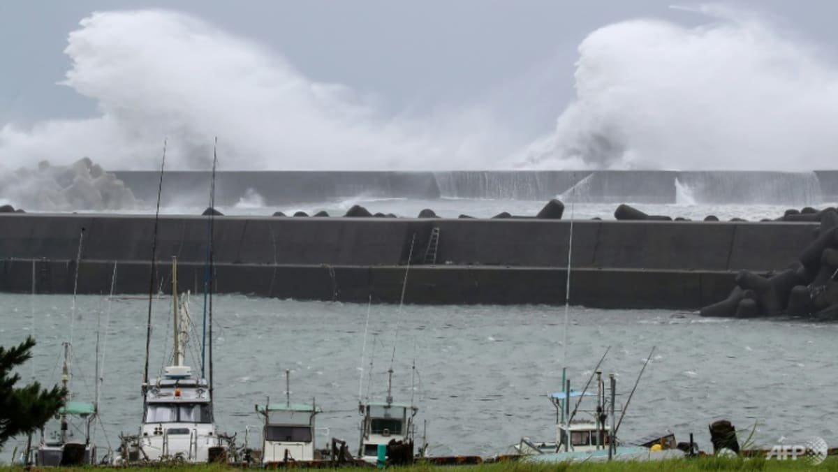 Over 180,000 residents urged to seek shelter as tropical storm soaks Japan Over 180,000 residents urged to seek shelter as tropical storm soaks Japan