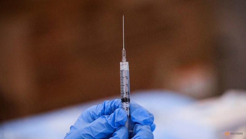 US judge blocks Biden federal employee COVID-19 vaccine mandate US judge blocks Biden federal employee COVID-19 vaccine mandate