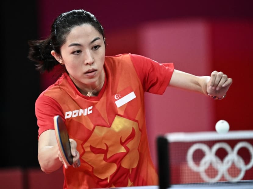 Singapore's Yu Mengyu competes against USA's Liu Juan during her women's singles round of 16 table tennis match at the Tokyo Metropolitan Gymnasium during the Tokyo 2020 Olympic Games in Tokyo on July 27, 2021.