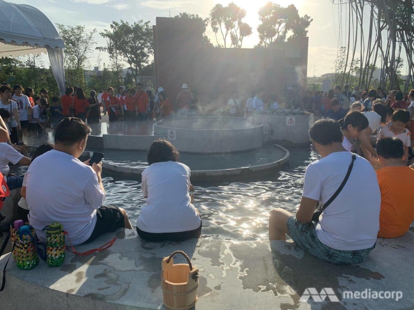 Visitors having a foot bath at the new Sembawang Hot Spring Park on Jan 4, 2020.